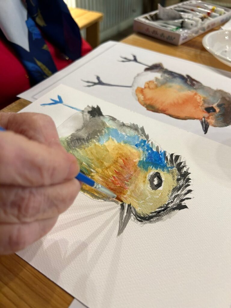 anziano che disegna